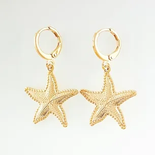 BRINCO TRANQUETA COM ESTRELA DO MAR