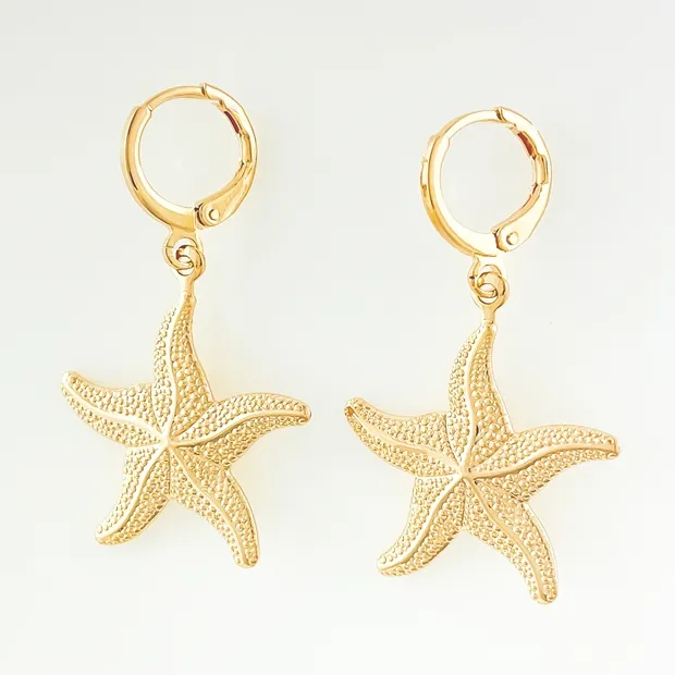 BRINCO TRANQUETA COM ESTRELA DO MAR