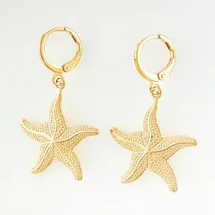 BRINCO TRANQUETA COM ESTRELA DO MAR