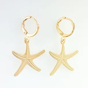 BRINCO TRANQUETA COM ESTRELA DO MAR