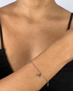 PULSEIRA COM FLORES VAZADA FEMININA